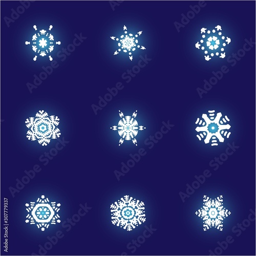 Kit of simple christmas snowflakes on blue background.