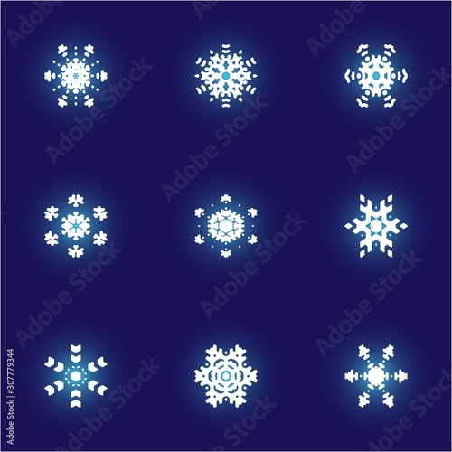 Collection of simple snowflakes on blue background.