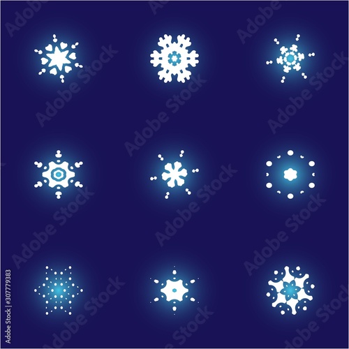 Collection of simple snowflakes on blue background.