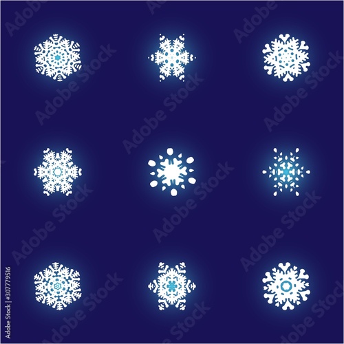 Set of christmas paper snowflakes on blue background.