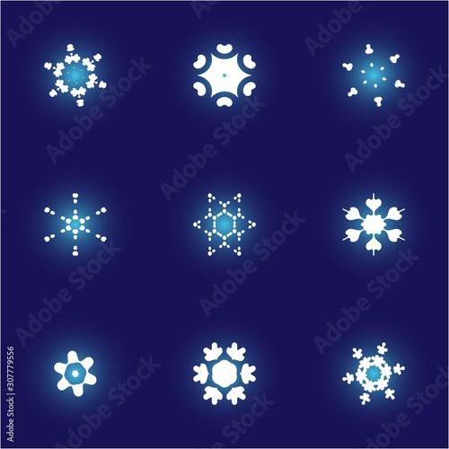 Collection of simple snowflakes on blue background.