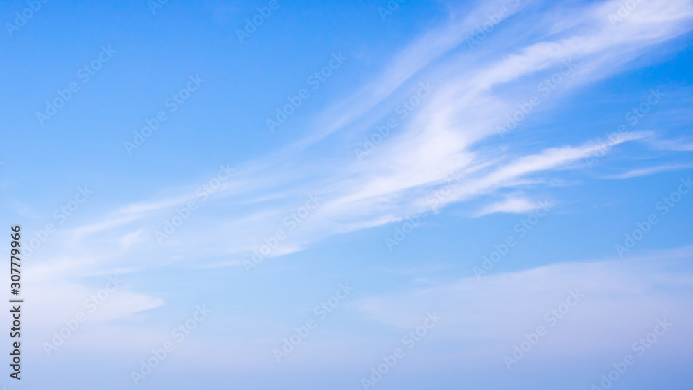 Soft and Clear Blue sky and soft white clouds at day time for background.
