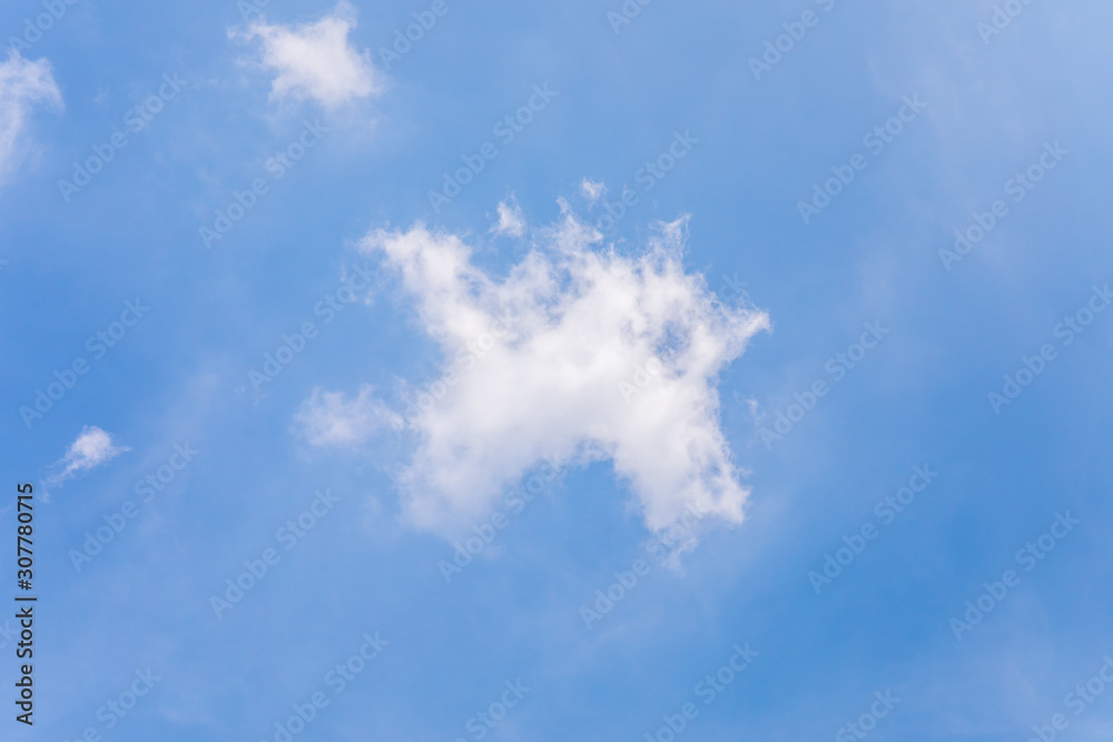 photo of blue sky and white clouds or cloudscape.