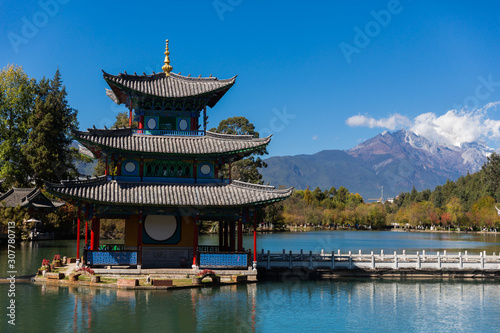 Black Dragon Pool and Wufeng Tower in Jade Spring Park, Lijiang, Yunnan Province, China