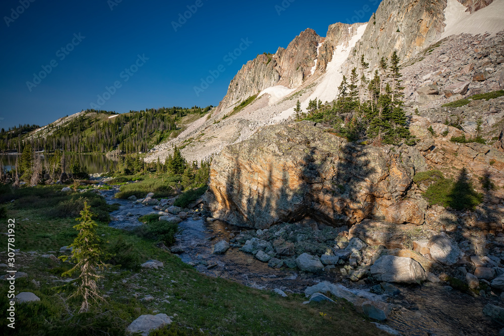 Summer afternoon along a meandering alpine stream in the Snowy Range Mountains of Wyoming Summer afternoon along a meandering alpine stream in the Snowy Range Mountains of Wyoming
