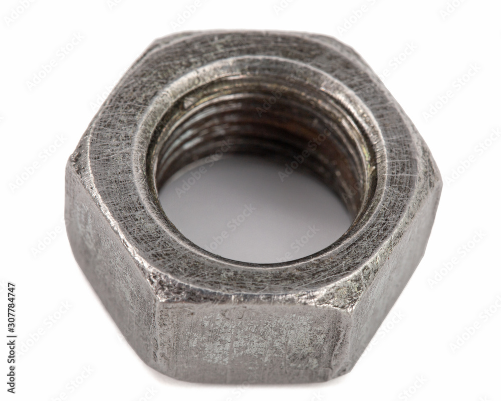Metal nut closeup, isolated on white background Metal nut closeup, isolated on white background