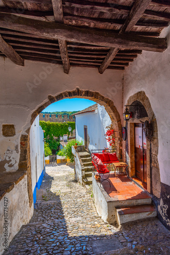 Obraz na płótnie a narrow street inside of the obidos castle in Portugal