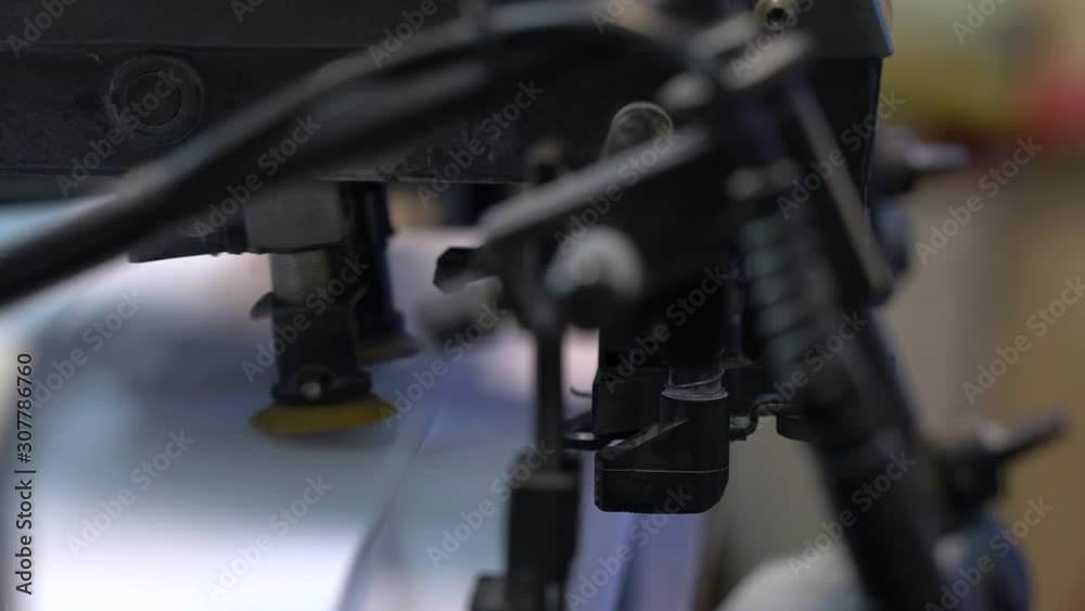 Printed sheets of paper are served in the printing press Printed sheets of paper are served in the printing press