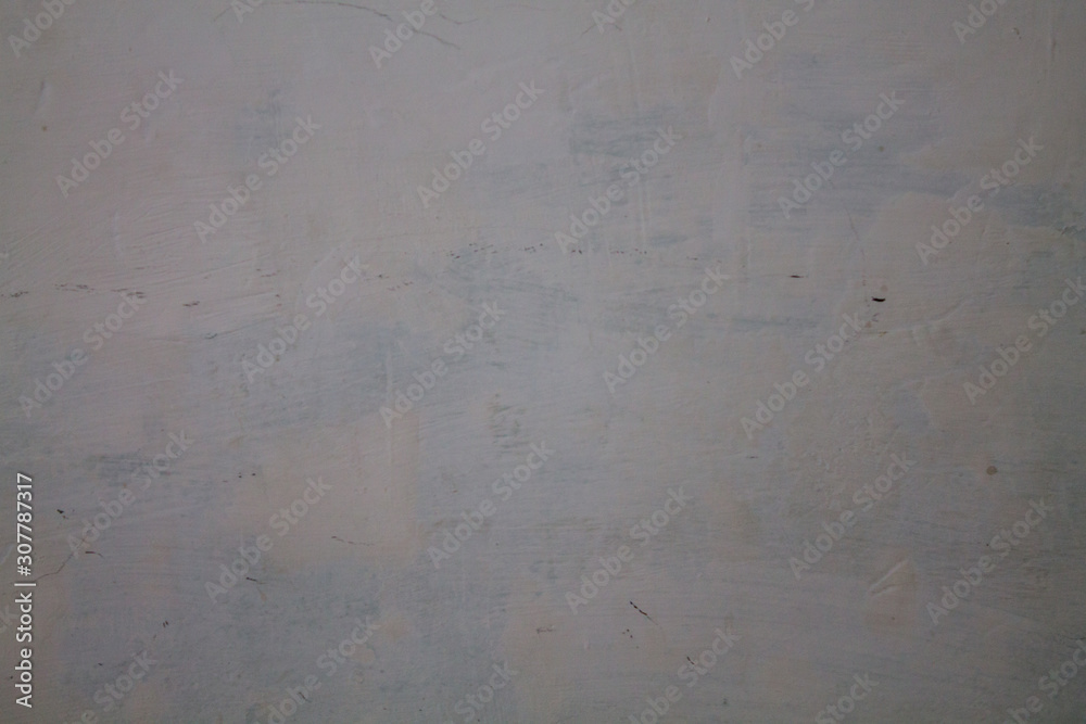 Fototapeta premium The texture of the wall with whitewash. Background for design.