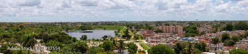 Aerial Panoramic view of a small Cuban Town, Ciego de Avila, during a cloudy and sunny day. Located in Central Cuba. © edb3_16