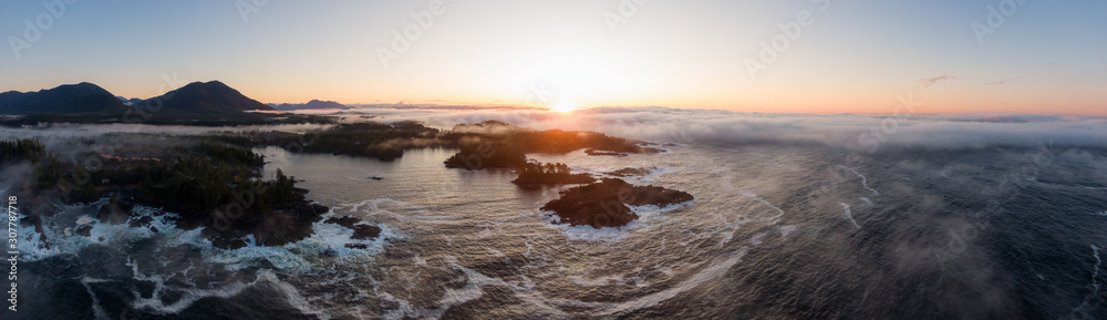 Ucluelet, Vancouver Island, British Columbia, Canada. Aerial Panoramic View of a Small Town near Tofino on a Rocky Pacific Ocean Coast during a cloudy  and colorful morning sunrise. - obrazy, fototapety, plakaty 