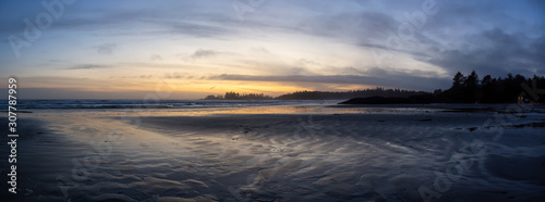 Long Beach, Near Tofino and Ucluelet in Vancouver Island, BC, Canada. Beautiful Panoramic view of a sandy beach on the Pacific Ocean Coast during a vibrant and colorful sunset. © edb3_16