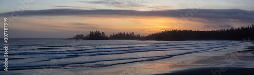 Long Beach, Near Tofino and Ucluelet in Vancouver Island, BC, Canada. Beautiful panoramic view of a sandy beach on the Pacific Ocean Coast during a vibrant sunset. © edb3_16