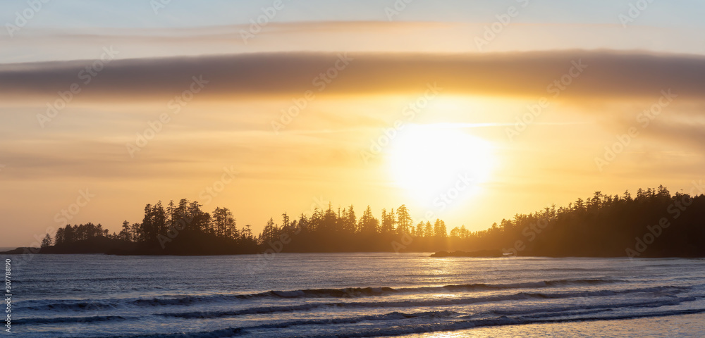 Long Beach, Near Tofino and Ucluelet in Vancouver Island, BC, Canada. Beautiful panoramic view of a sandy beach on the Pacific Ocean Coast during a vibrant sunset.