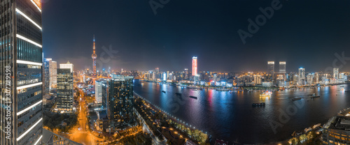 The night view of the city on the huangpu river bank in the center of Shanghai, China