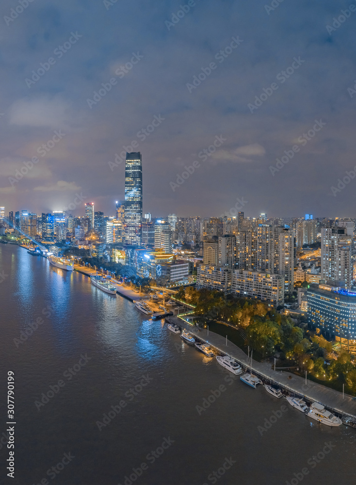 Fototapeta premium The night view of the city on the huangpu river bank in the center of Shanghai, China
