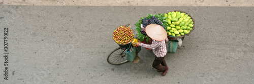 Aerial view of street vendor walking in Hanoi, Vietnam　ベトナム・ハノイの通りを歩く行商人 俯瞰 photo