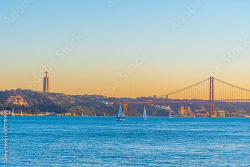 Bridge of 25th April and National sanctuary of Cristo Rei in Lisbon, Portugal