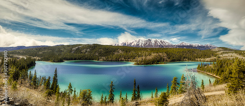 Panorama of Emerald Lake, It is located in the Yukon Territory of Canada. photo
