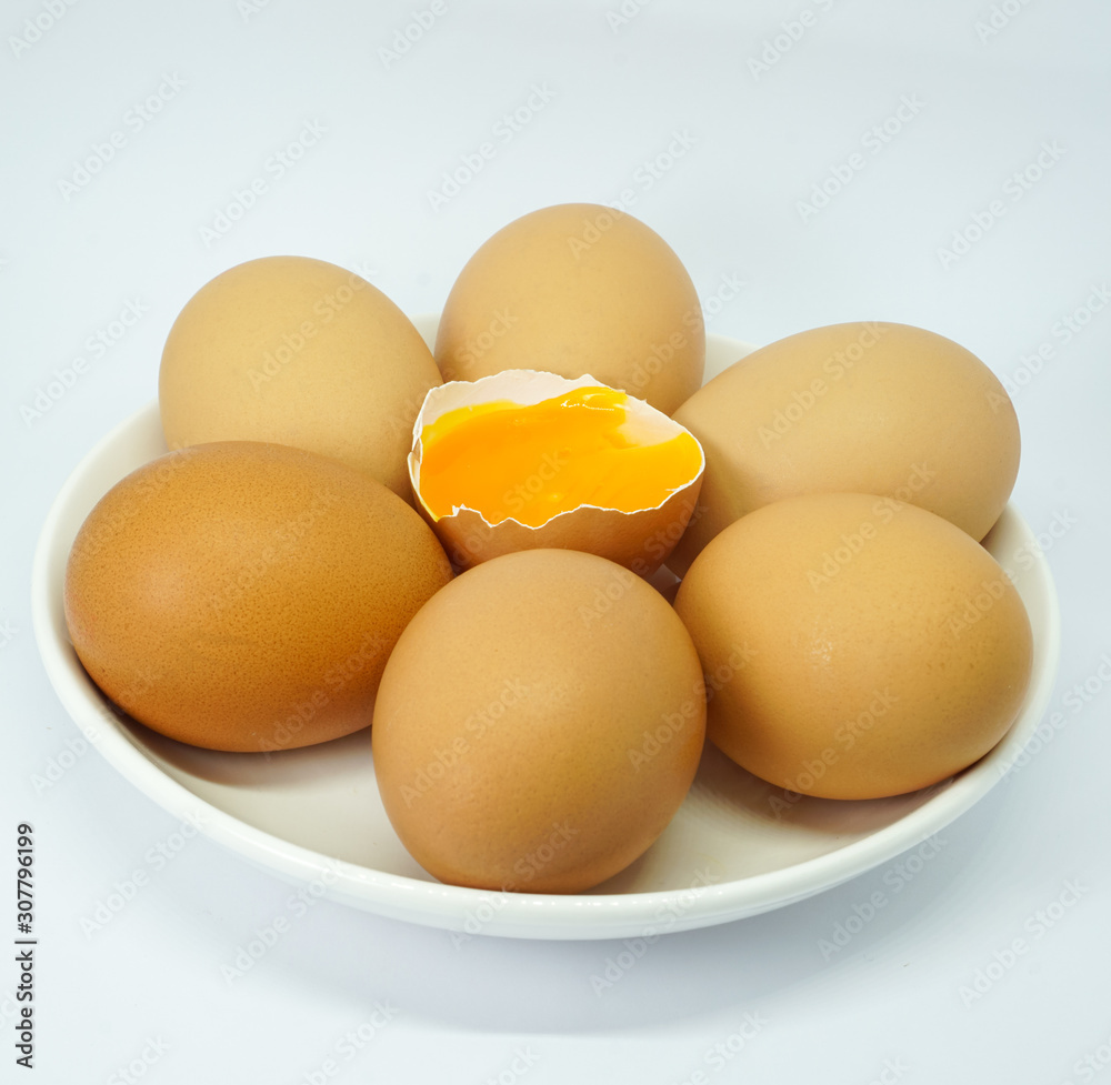 organic eggs in white dish isolated on white background organic eggs in white dish isolated on white background