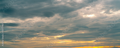 Morning sunrise sky and white clouds. Beautiful golden sunrise sky with white fluffy clouds. White fluffy cloudscape abstract background. Beauty in nature. Dramatic heaven sky. Art picture background