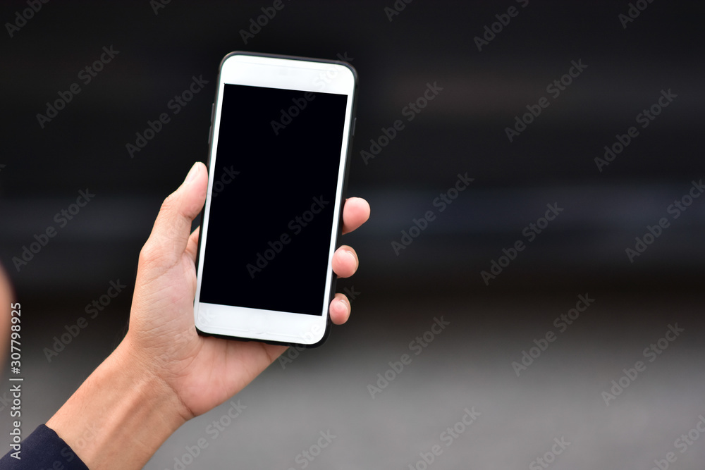 Business people holding cell phone or mobile smart phone technology communication Business people holding cell phone or mobile smart phone technology communication