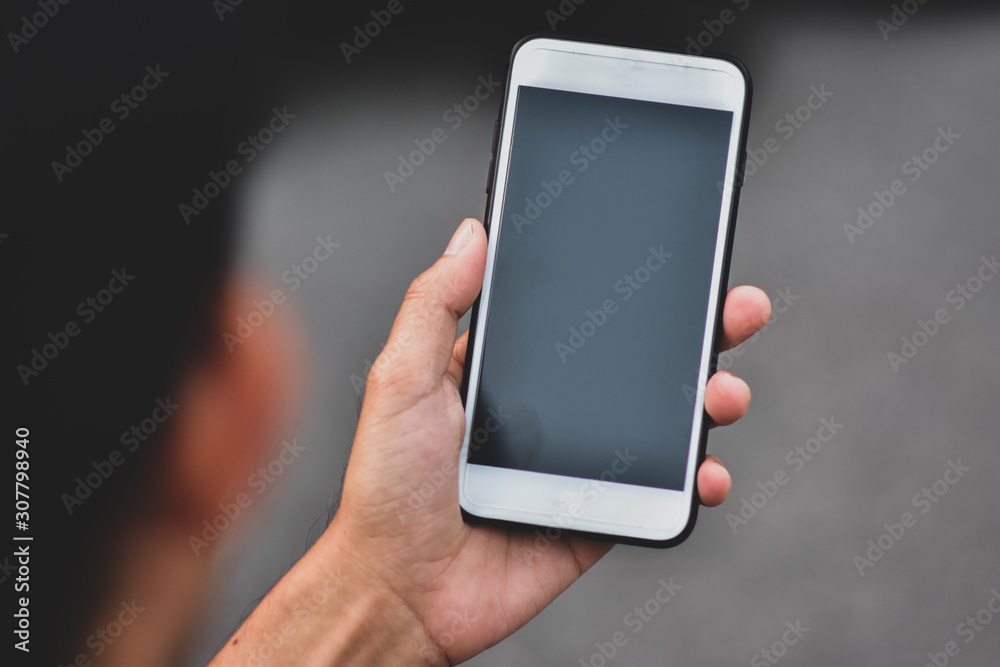 Business people holding cell phone or mobile smart phone technology communication Business people holding cell phone or mobile smart phone technology communication