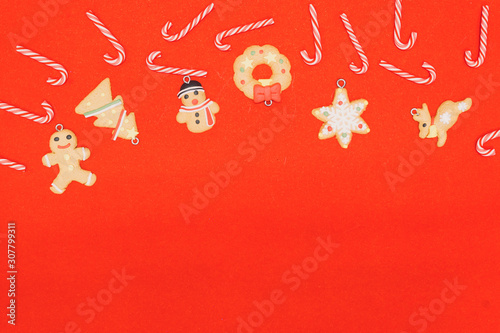 The candies were filled in the red scene, representing the Christmas, New Year theme. There was space to copy space. Some characters represent Christmas, such as cookies, reindeer, snowmen.