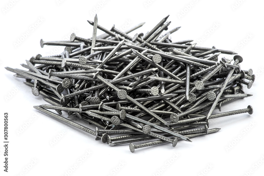 Pile of construction nails on a white isolated background_ Pile of construction nails on a white isolated background_