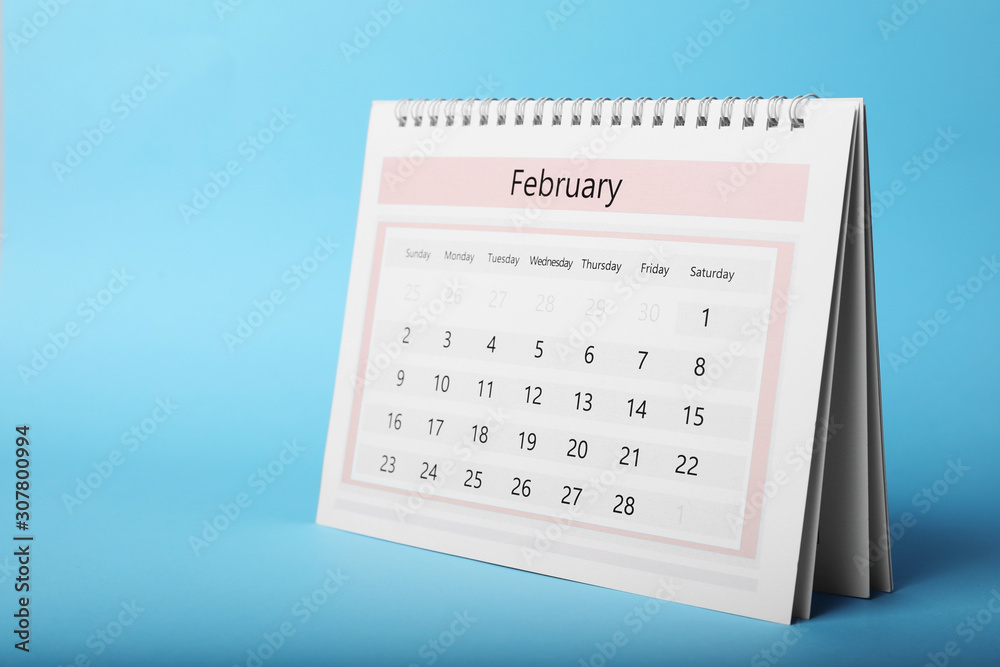 Paper calendar on light blue background. Planning concept Paper calendar on light blue background. Planning concept