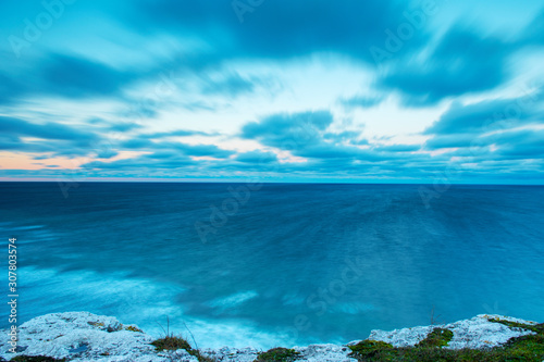 Cloudy Sky During Sunrise On An Cold Winter Morning At Island Of Gotland, Sweden Long Exposure
