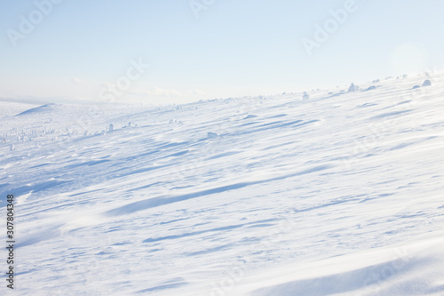 Winter landscape. Snow covered fields in the north