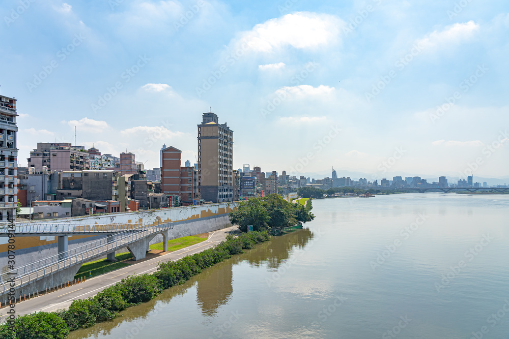 Scenery of Tamsui river bank, view on Taipei bridge, a bridge link New Taipei City to Taipei city, Taiwan