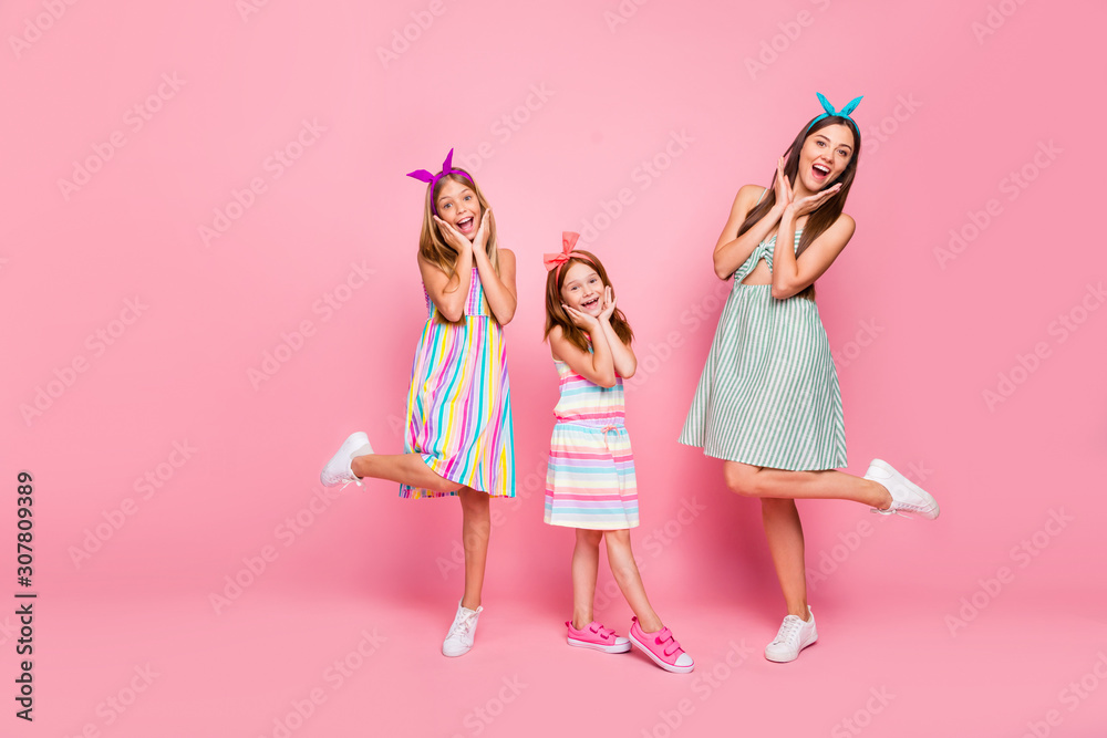Full size photo of cheerful siblings screaming wow omg touching their faces wearing dress skirt headband isolated over pink background - obrazy, fototapety, plakaty 