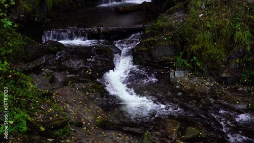 Waterfall in the Altai mountains on lake Teletskoye