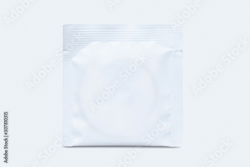 Condom pack copyspace mockup advertising design. condom on white background. White condom sachet mock up.