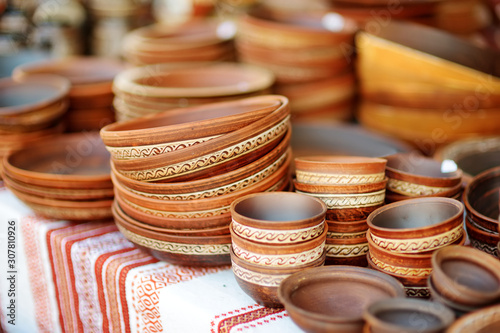 Ceramic dishes, tableware and jugs sold on Easter market in Vilnius, Lithuania © MNStudio