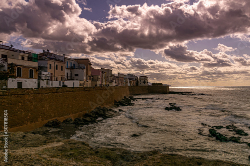 Clouds over Alghero seafront. Sardinia, Italy.