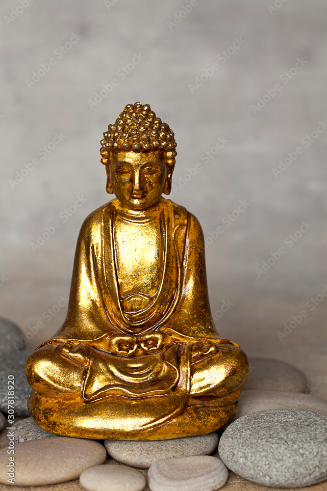 Golden Buddha Statue And Pebble Golden Buddha Statue And Pebble