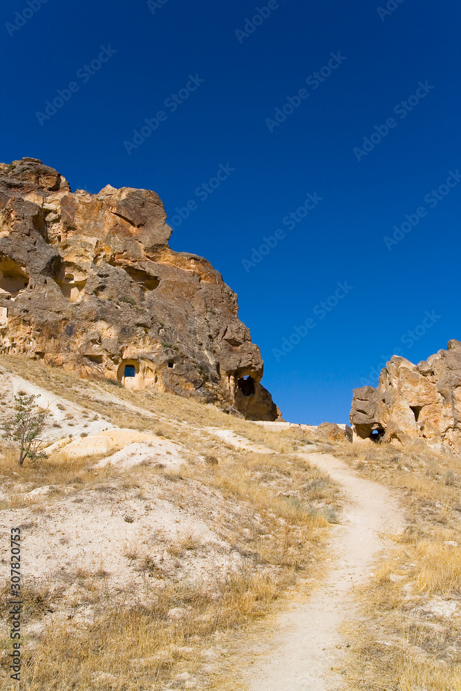 The trail leads to the ancient cave city.
