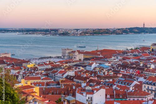 Sunset view of cityscape of Lisbon with Praca do Comercio square, Portugal photo