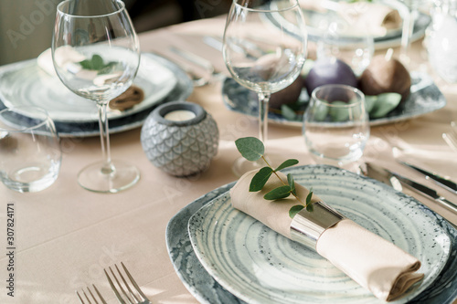 Luxury table setting for dining in pastel colors close up