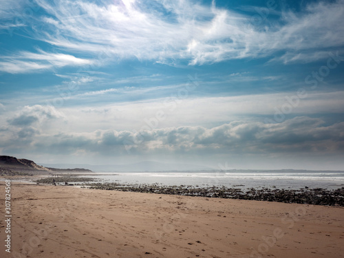 Beautiful clouds over Strandhill sandy beach, county Sligo, Low tide, Calm and peaceful scene. Ireland. Atlantic ocean,