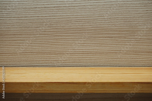 Wooden shelves on white wooden background For display