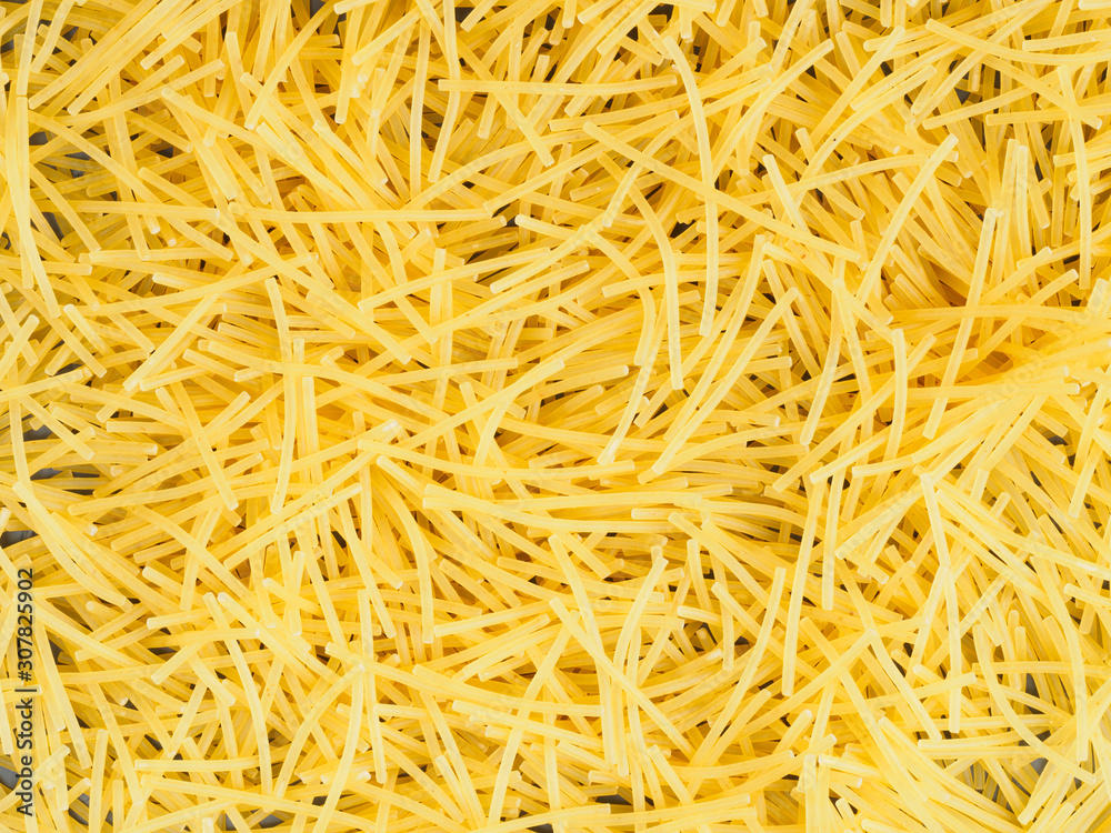 Background of little yellow pasta. Healthy eating concept Background of little yellow pasta. Healthy eating concept