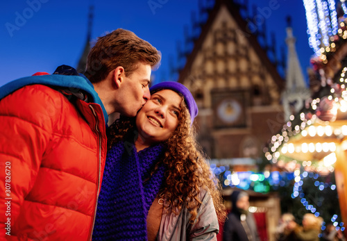 Young couple on Christmas market in Wroclaw, Poland © Masson