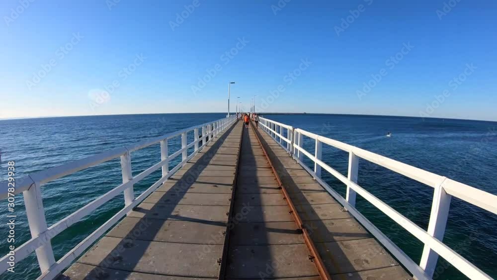 Time Lapse of person POV (Point of view) walking on Busselton jetty train in Busselton city Western Australia Time Lapse of person POV (Point of view) walking on Busselton jetty train in Busselton city Western Australia