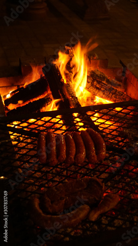 Cosy fire light up for a BBQ at a house in Stormsrivier, South Africa. photo