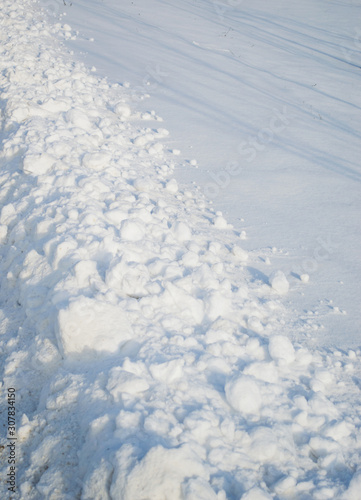 Snow drifts  white background.