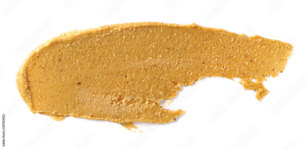 Fototapeta premium Peanut butter isolated on white background, top view